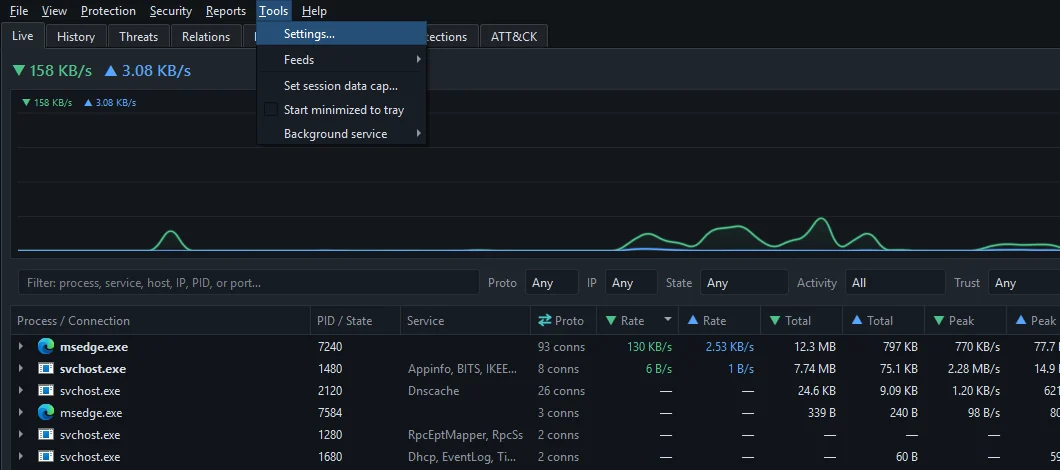 The Tools menu open, showing Settings, Feeds, Set session data cap, Start minimized to tray and Background service